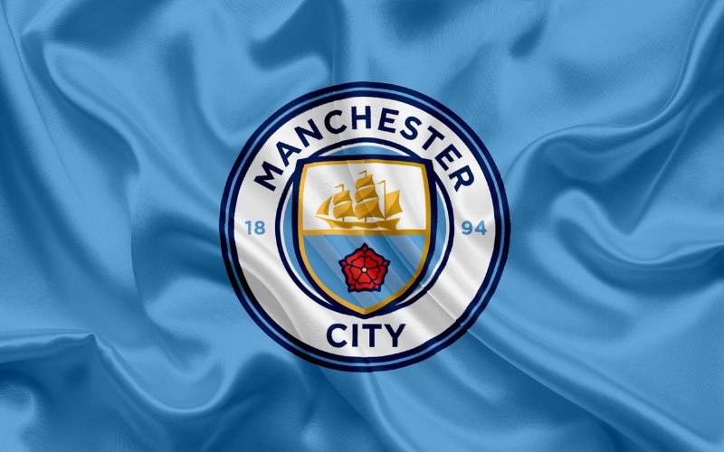 Logo Man City với hình ảnh con thuyền đại diện cho Manchester Ship Canal